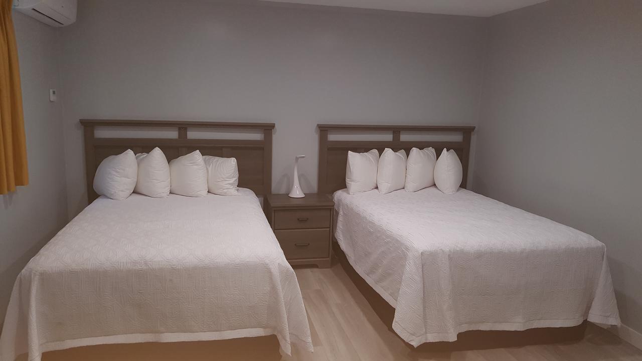 폼파노 비치 The Palms On Ocean 모텔 외부 사진
